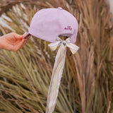 Purple Cap with Printed Bow Detail in the Back